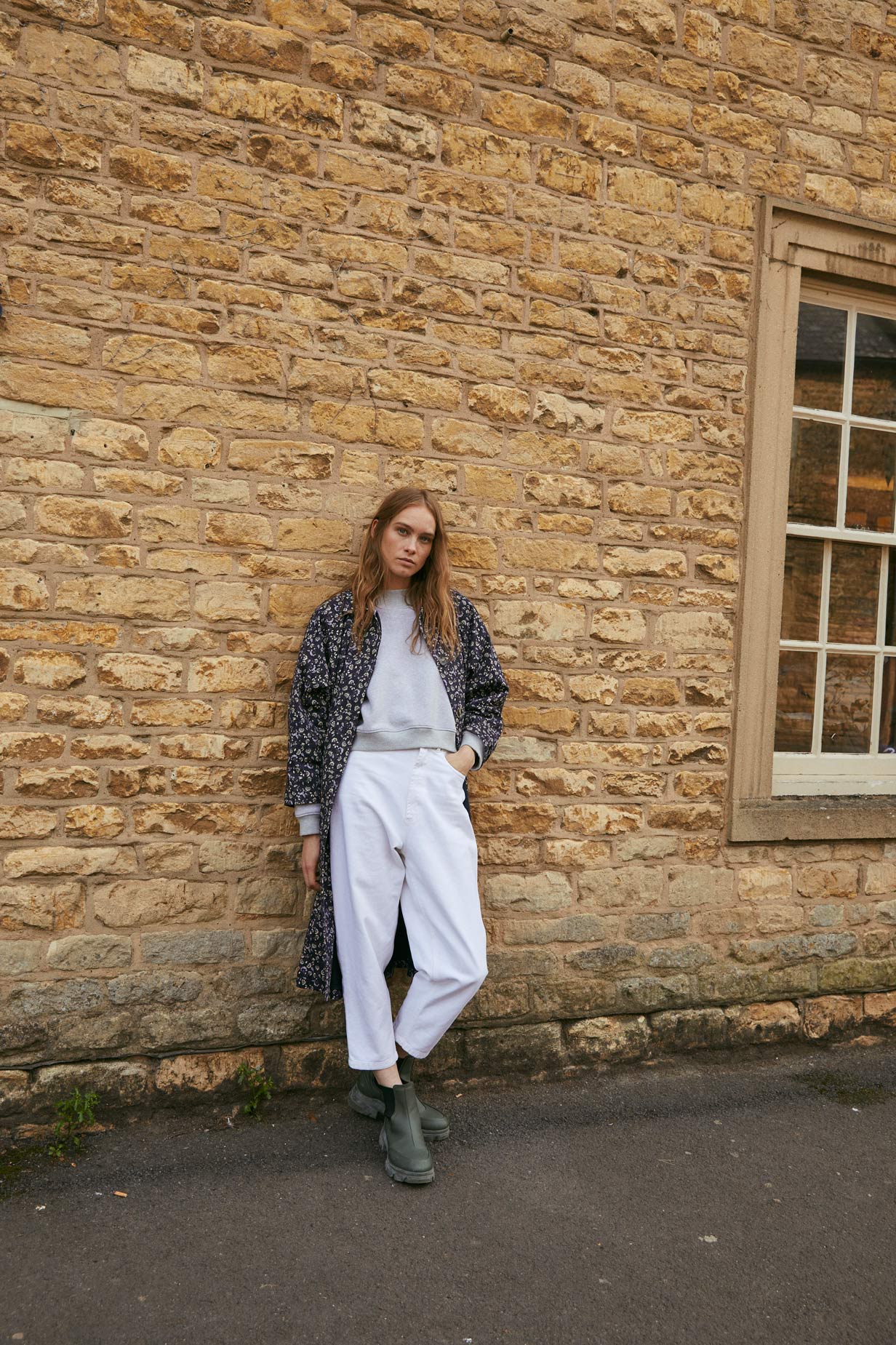 TRENCH COAT OVER FLOWERS