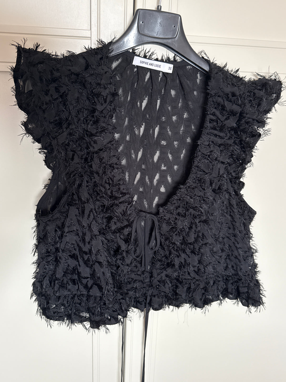 TOP CAROL FLECO NEGRO
