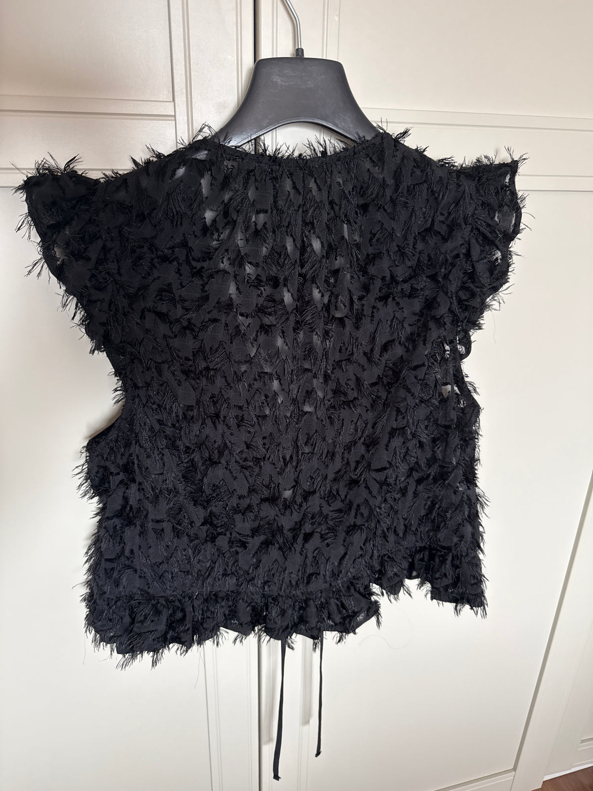 TOP CAROL FLECO NEGRO