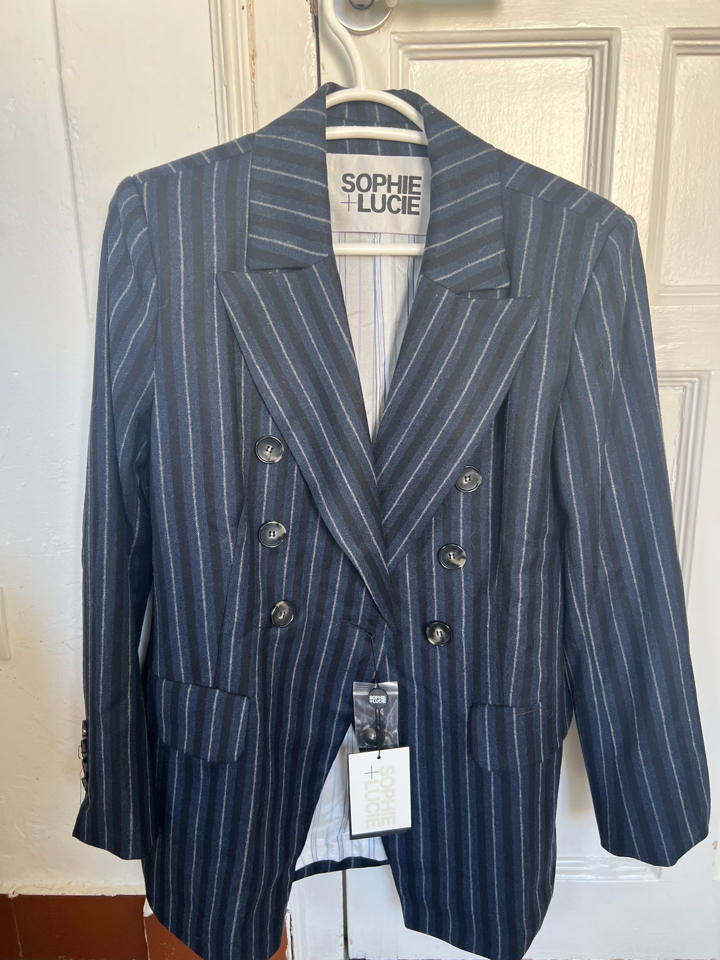 Blazer cruzada azul marino rayas